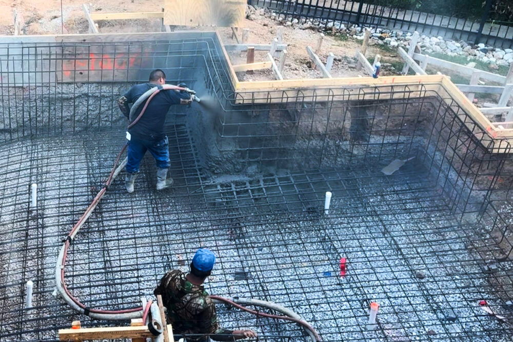 St. Louis crew spraying custom Gunite pool